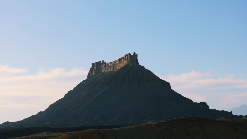 Factory Butte in Utah. Aerial drone lateral and sky for copy space