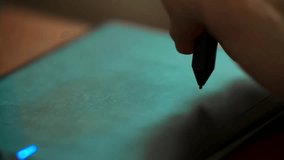 A close-up of the stylus pen for a graphics tablet. Rustic Charm Meets Digital Craft. Photographer Editing Session - Powered by Shutterstock - Get 15% off with code: PIKWIZARD15