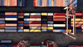 Cargo containers top aerial view. Containers at logistics terminal. Cargo import and export port and is part of a shipping dock.  - Powered by Shutterstock - Get 15% off with code: PIKWIZARD15