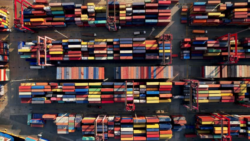 Container terminal port aerial view. Industrial cargo port. Logistic center. Import and export port and is part of a shipping dock. 