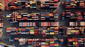 Container terminal port aerial view. Industrial cargo port. Logistic center. Import and export port and is part of a shipping dock.  - Powered by Shutterstock - Get 15% off with code: PIKWIZARD15