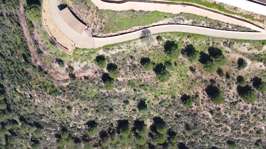 Aerial drone view of San Marcos Castle in a mountain of Sanlucar de Guadiana village in Huelva province, Andalusia, on the banks of Guadiana river, in the border of spain with portugal