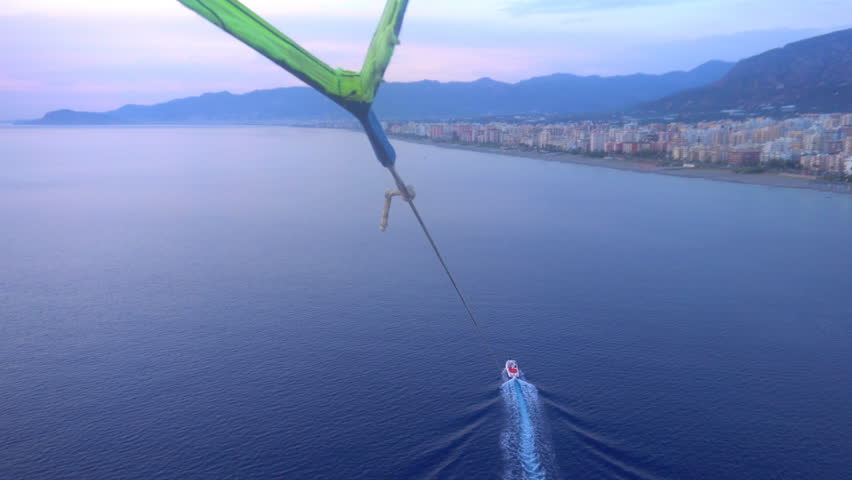 Parasailing above the Mediterranean sea.