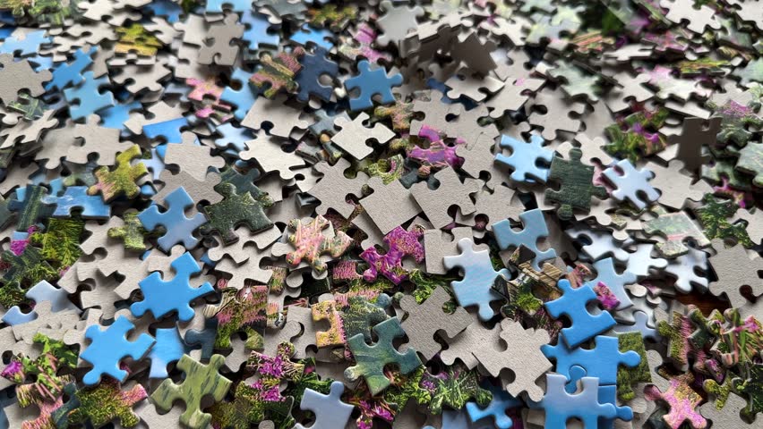 Puzzle pieces are slowly falling, background from many puzzle game pieces, leisure activity, slow motion,4k Royalty-Free Stock Footage #3435201859