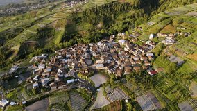 Aerial view of countryside on the slope of Sumbing Mountain, Indonesia. Tropical rural landscape. Asia