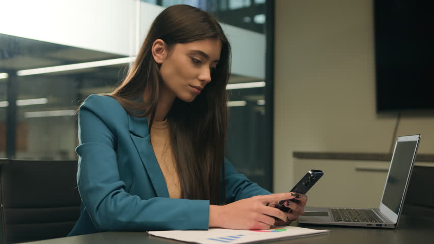 Arabian girl Indian business woman Caucasian businesswoman reading good news on smartphone victory great sms receive female at office desk hold mobile phone read email celebrate success career achieve Royalty-Free Stock Footage #3435204615