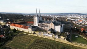 Bamberg Kloster Michelsberg Drone video flying away revealing cityscape and vineyard