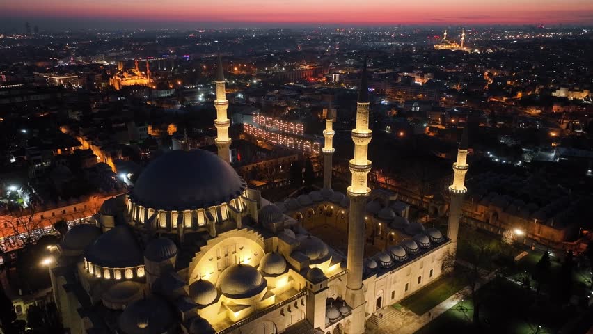 Happy Ramadan Feast Text in the Suleymaniye Mosque, Illuminated Letters Between Minarets (Mahya) Drone Video, Suleymaniye Fatih, Istanbul Turkey Royalty-Free Stock Footage #3435258843