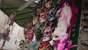 Exquisite feathered Venetian masks stand, Venice Italy - Powered by Shutterstock - Get 15% off with code: PIKWIZARD15