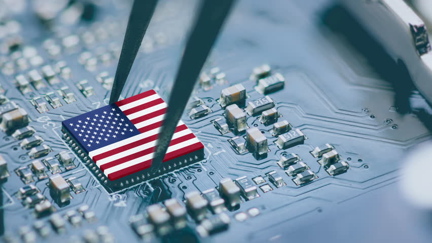 Flag of USA on a processor, CPU Central processing Unit or GPU microchip on a motherboard. Congress passes the CHIPS Act of 2022 to strengthen domestic semiconductor manufacturing, research and design Royalty-Free Stock Footage #3435387537