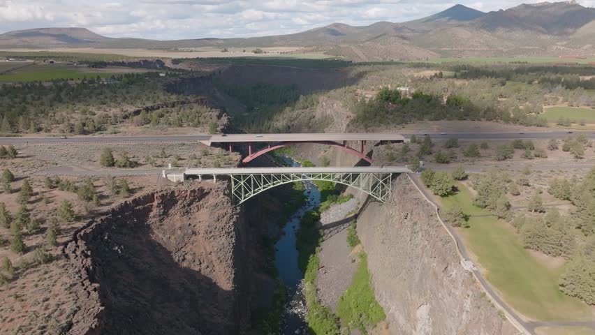 Roadtrip cars and trucks travelling driving along road in US