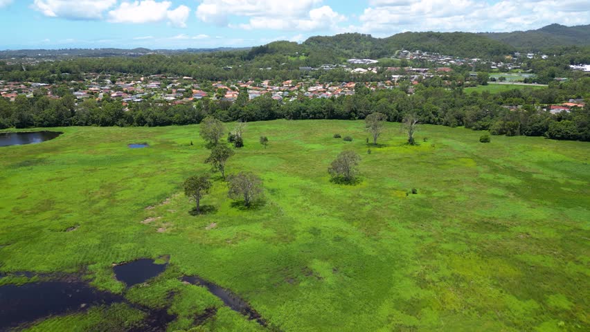 Aerial over Firth Park, Mudgeeraba looking towards the Hinterland, Gold Coast, Queensland, Australia