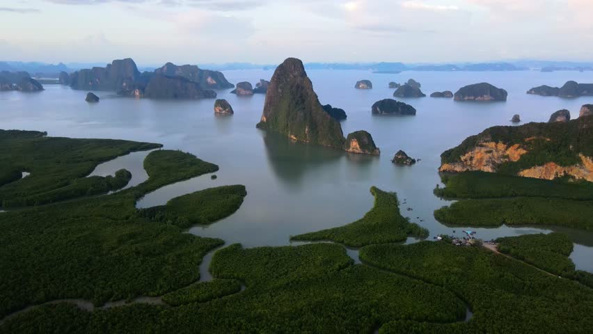 panorama view of Sametnangshe, view of mountains in Phangnga Bay with mangrove forest in Andaman sea with evening twilight sky, travel destination in Phangnga, Thailand Royalty-Free Stock Footage #3435483869