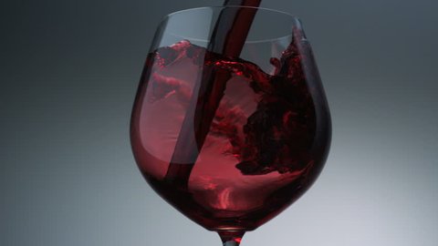 Pouring red wine into glass shooting with high speed camera, phantom flex.
