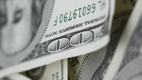 Vertical video of hundred dollar bills