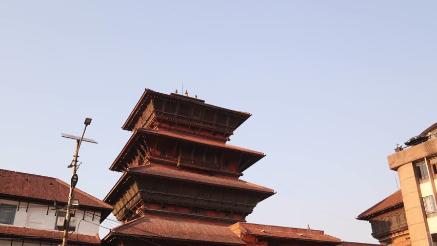 tall pagoda style temples in durbar square In Kathmandu, Nepal at the base of the Himalayas