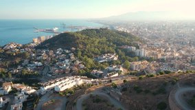 Aerial 4K video from drone to the city of Malaga and old town Malaga at at sunset. Malaga,Costa del sol, Andalusia,Spain, (Series)