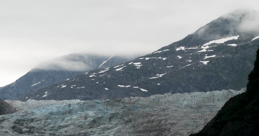 Mendenhall Glacier and the surrounding mountains covered with clouds, Alaska