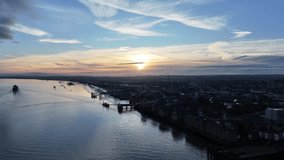 Aerial 4K video of Gravesend, Kent on the River Thames at sunrise