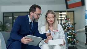 Pharmaceutical sales representative talking with doctor in medical building. Female doctor talking with hospital director, manager in private clinic. - Powered by Shutterstock - Get 15% off with code: PIKWIZARD15