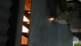 CNC machine. Laser cutting of metal. Vertical video. 
