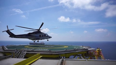 KELANTAN, MALAYSIA - NOVEMBER 16th, 2017 : A commercial helicopter Agusta Westland AW 139 ready to take off after taking offshore workers who signed off from duty at oil and gas platform.