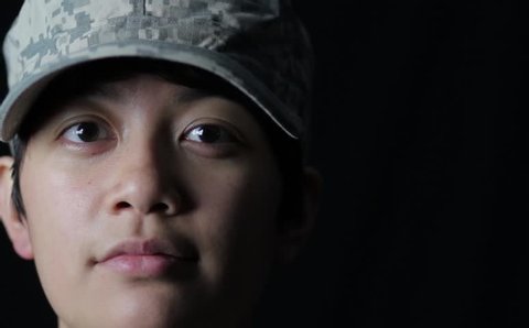 Asian woman soldier in uniform