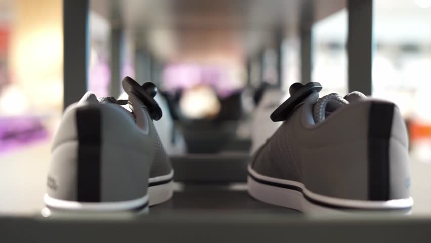 shoes in a store on a shelf