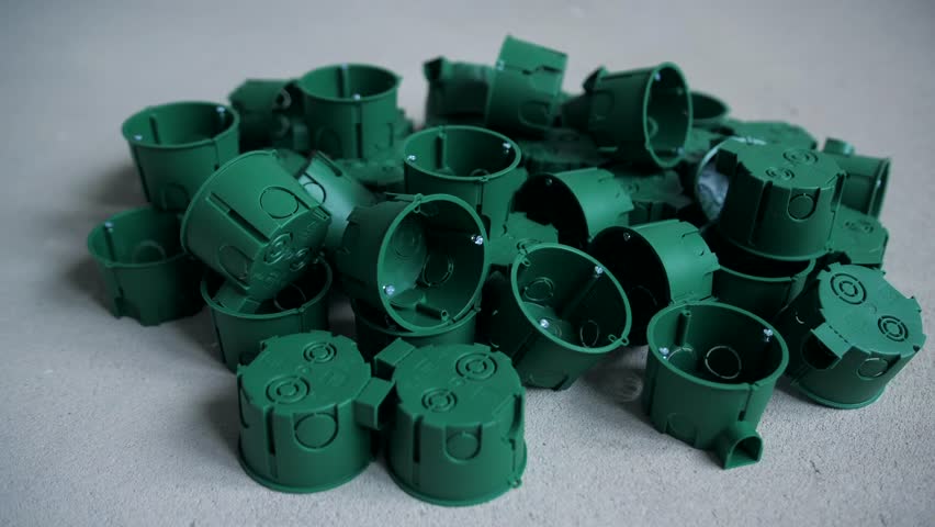 There are a lot of mounting boxes for sockets on the floor. Electrical installation in the apartment.