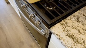 In a modern white kitchen, large organic asparagus is being steamed in a sizable cooking pot. - Powered by Shutterstock - Get 15% off with code: PIKWIZARD15