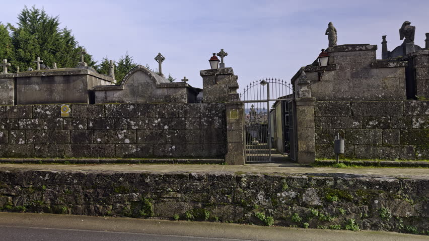 Gateway to Eternity: The Solemn Entrance of a Cemetery Royalty-Free Stock Footage #3436405879