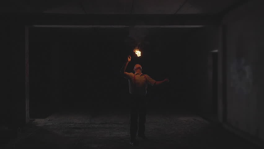 Fire show artist breathe fire in the dark at abandon building, slow motion. Fire in heart shape. | Shutterstock HD Video #34366036