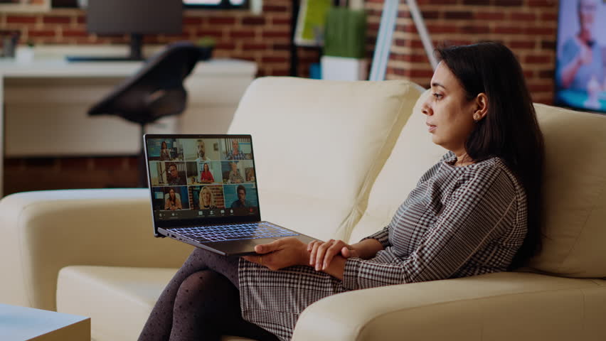 Management executive remotely delegating project tasks to employees during teleconference meeting. Indian manager at home holding online videocall with international multiethnic team Royalty-Free Stock Footage #3436638165
