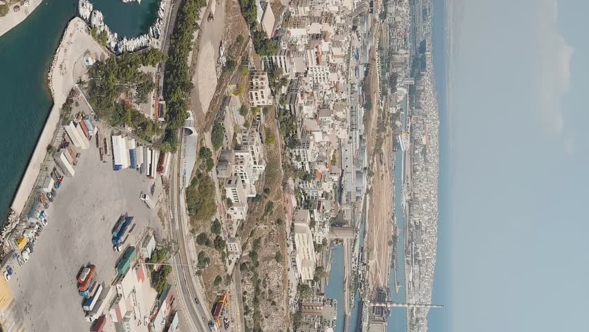 Vertical video. Athens, Greece. City and port panorama. View of Piraeus, Aerial View