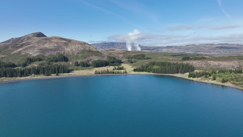 Aerial view over Thingvallavatn lake in Iceland with the Nesjavallavirkjun geothermal powerplant in the background