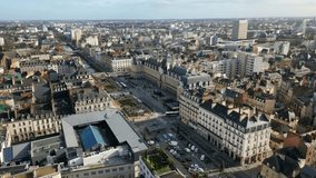 Republic Square or Place de la Republique and Commerce Palace at Rennes City, France. Aerial forward and cityscape