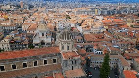 Catania, Sicily, Italy, Volcano Etna historical city center drone 4K video travel aerial view with Catholic Cathedral of Saint Agatha, elephant statue from lava square Duomo