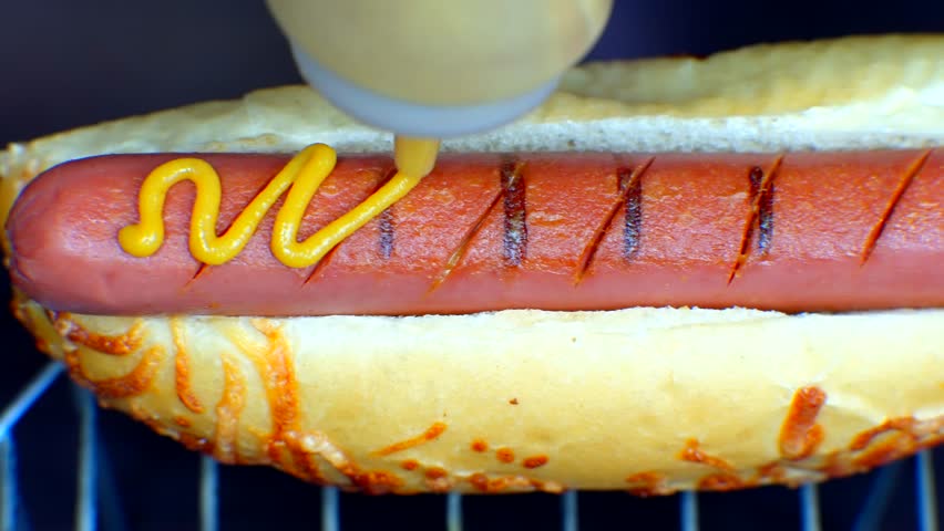 HotDog Served Mustard And Ketchup. Tasty American Fast Food. Tasty HotDog With Grilled Sausage. Appetizing Street Food.Grilled Sausage HotDog Junk Food. Adding Ketchup And Mustard To Tasty HotDog Meat Royalty-Free Stock Footage #3437114423