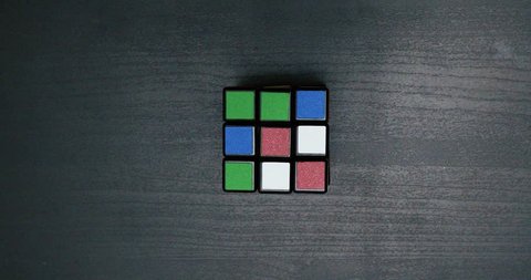collecting a colorful puzzle cube close up