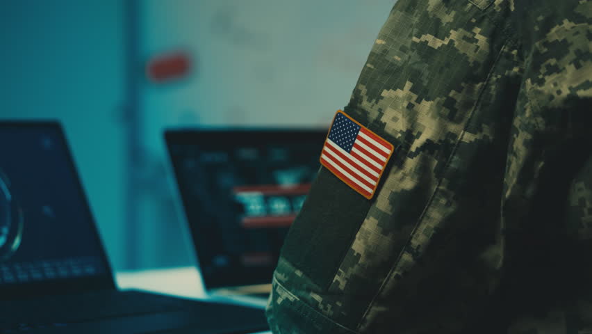 USA military officer working in office, countdown to launch of ground operation - Powered by Shutterstock - Get 15% off with code: PIKWIZARD15