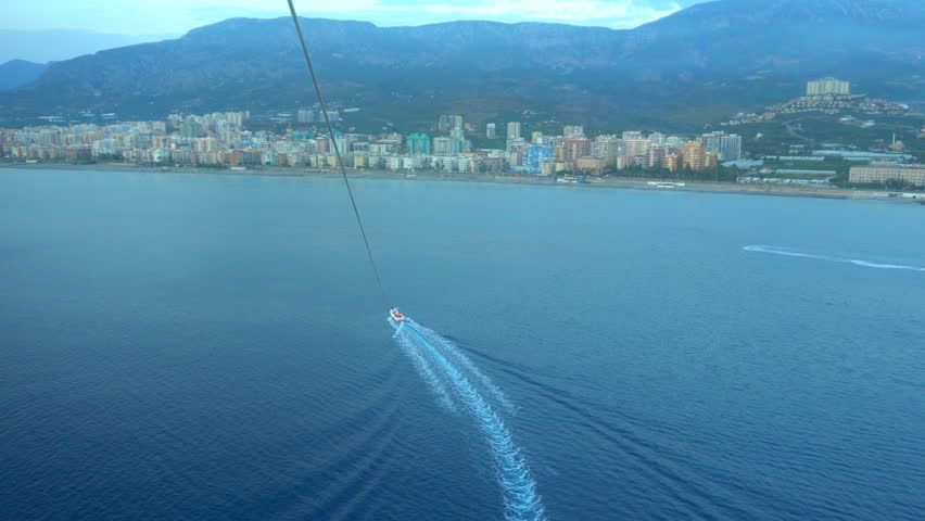 Parasailing above the Mediterranean sea.