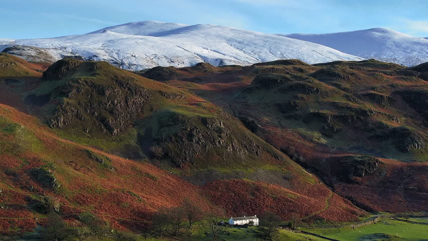 Aerial autumn landscape and snow capped fells near Keswick, Lake District National Park, Cumbria, England