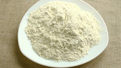 Flour on a plate, slow rotation.