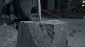 Close up of drilling a cement block. Clip. Industrial works at the construction site.