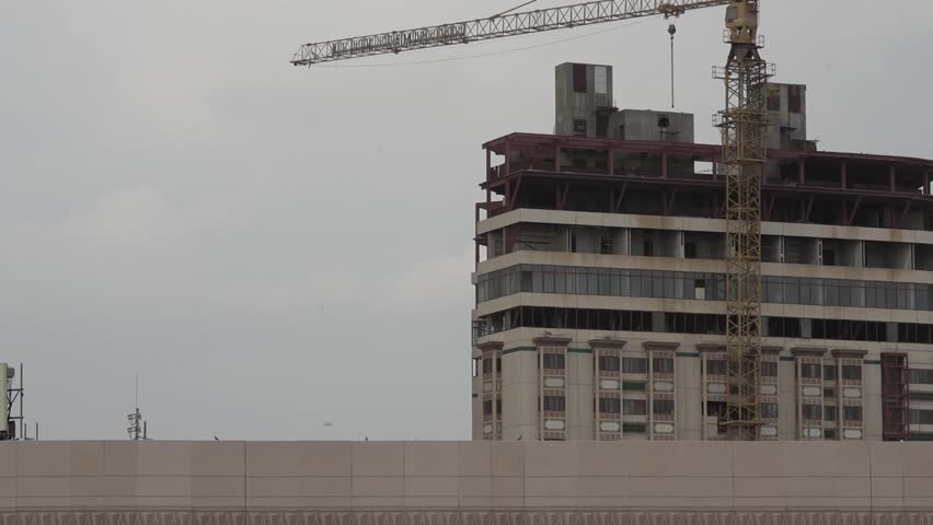 Time lapse view of the construction site with crane