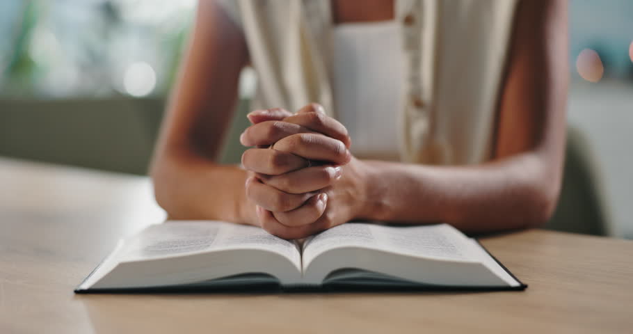 Hands, praying and woman with bible at her home for worship, religion or spiritual wellness. Gratitude, prayer and closeup of female person with holy book for christian faith and peace in apartment. Royalty-Free Stock Footage #3437518729