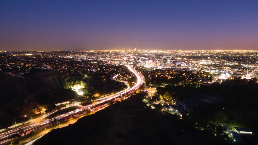 Aerial Lockdown Scenic View Of Illuminated City Landscape Against Clear Sky At Night - Los Angeles, California