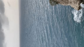 Aerial view of beautiful costal shore in Vlore, Albania. High quality Full HD footage. Summer holidays concept. Vertical video