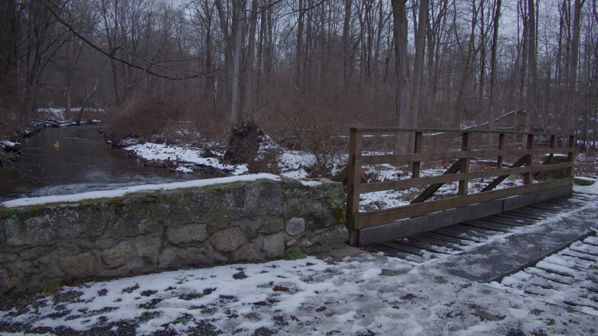 A Calming Snowy Creek in Winter