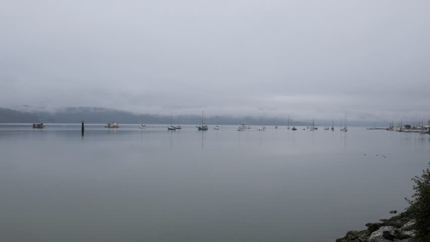 Boats in front of the shore of Cowichan Bay on Vancouver Island in British Columbia, Canada